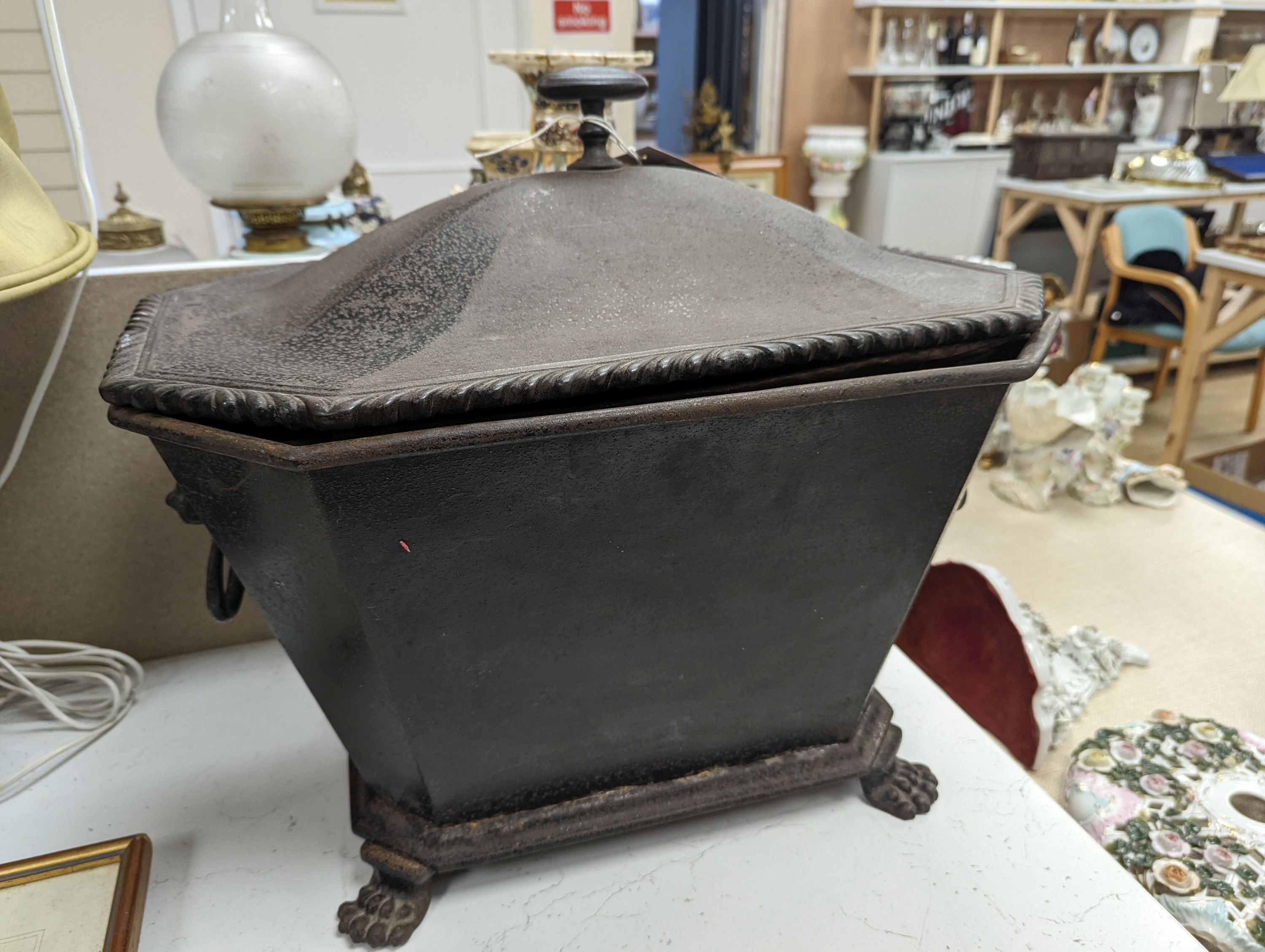 An iron wine cooler/coal box, 47 cms high.